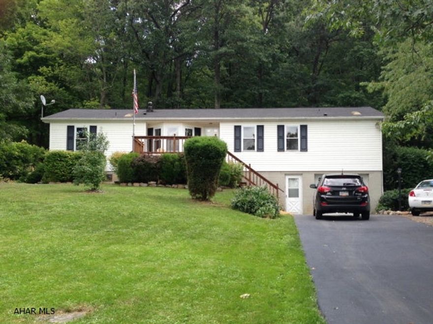 This 3 bedroom, 2 full bath home sports great curb appeal and the moment you walk in the home, the pride in ownership is obvious, as the home has been beautifully maintained. Shawnee Vinyl replacement windows are found throughout and a newly installed gas fireplace make for great energy efficiency. A main floor laundry room, huge country kitchen with loads of storage make this the ideal country home. The roof was replaced less than 4 years ago. The large sunroom is a great place to simply relax and enjoy nature. A lovely front deck takes in wonderful views of Wills Mountain. A storage shed and fire pit round out this great yard. State games lands are less than a mile down the road. Lake Gordon and Lake Koon provide amazing fishing opportunity.