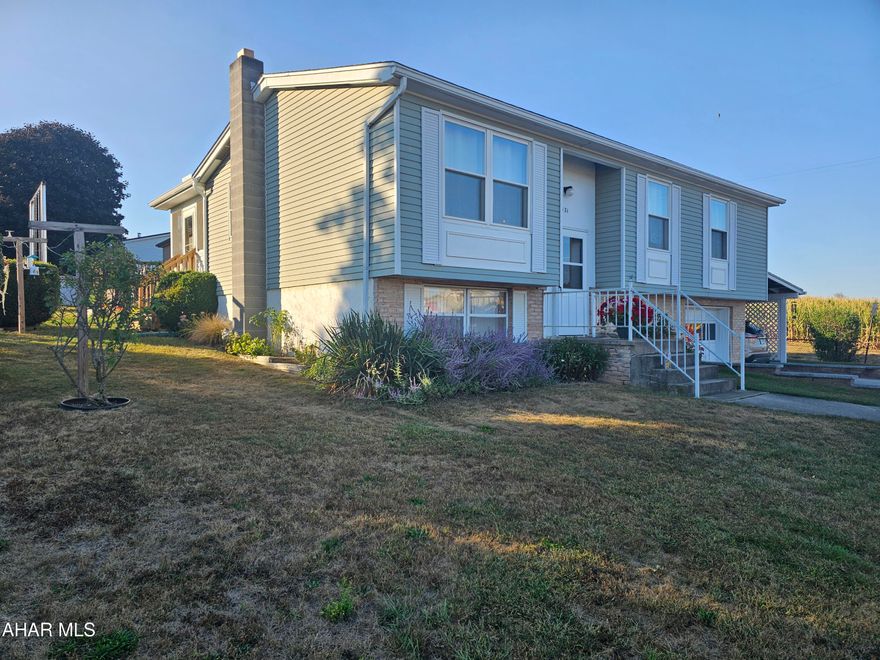 BACK ON THE MARKET BY NO FAULT OF THE HOME!! This home is move in ready, just unpack your bags!!, It has been tenderly cared for, for many years. New roof,  new hot water heater, oil furnace with central air, water softener, new dishwasher, Double oven, new washer and dryer. New screened in back porch, with a garage and carport and plenty of off street parking. The family room in the first level is perfect for a growing family. Call me today to come and tour this adorable home in the COVE.