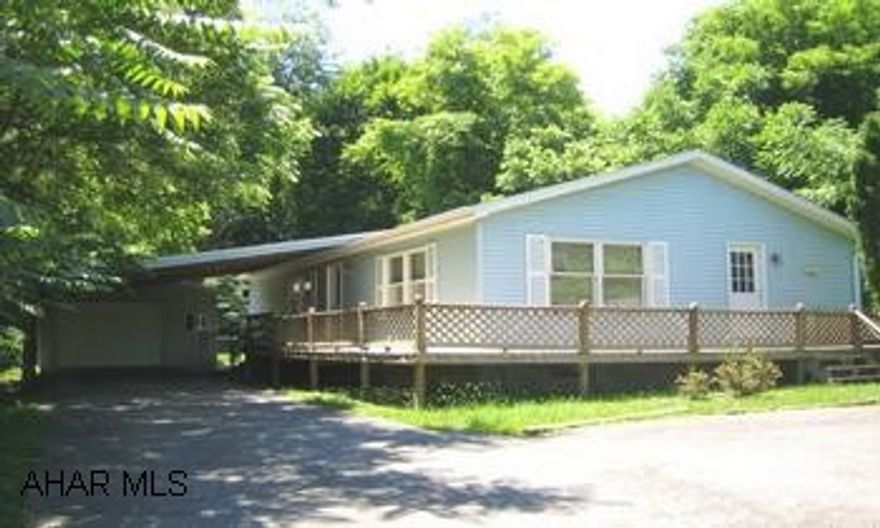 UPDATES ABOUND in this rancher on private lot. New kitchen, carpeting, and roof. Vinyl siding. 1 car garage, carport, wheelchair ramp, freshly painted throughout.  All on a treed, private lot. Check it out! UPDATES ABOUND in this rancher on private lot. New kitchen, carpeting, and roof. Vinyl siding. 1 car garage, carport, wheelchair ramp, freshly painted throughout. All on a treed, private lot. Check it out!