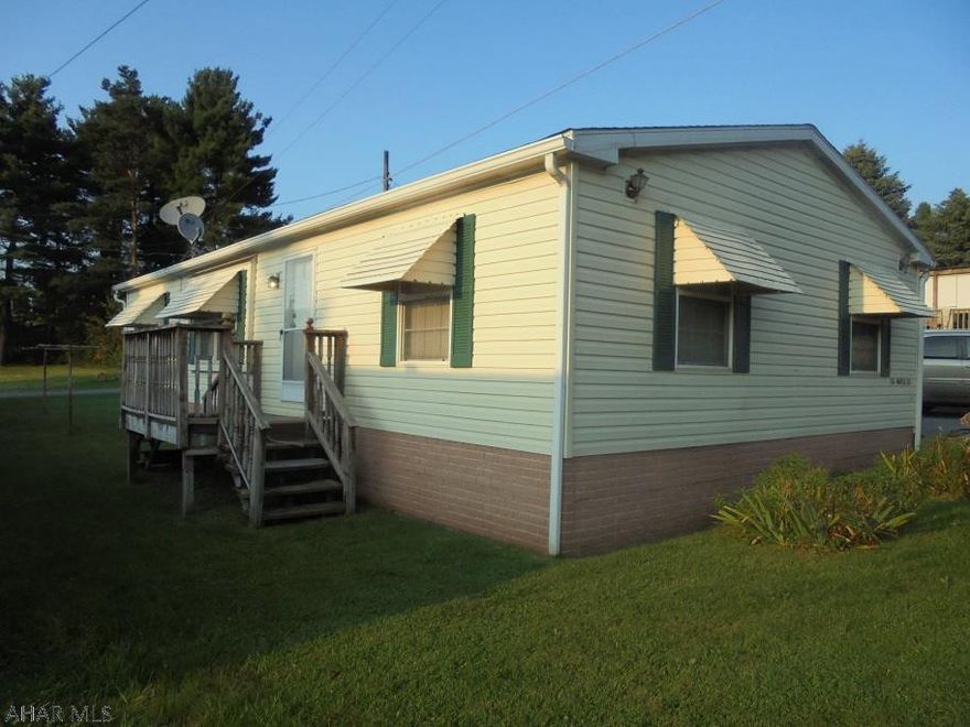 Amazing find! NO LOT RENT! 55 x 100 lot included in the sale. Spacious home with sky lights, 3 BR, 2 bath. Master Bedroom suite has walk-in closet, private bath with garden tub & shower.  Large enclosed porch, large wood deck.  New furnace installed in 2016.