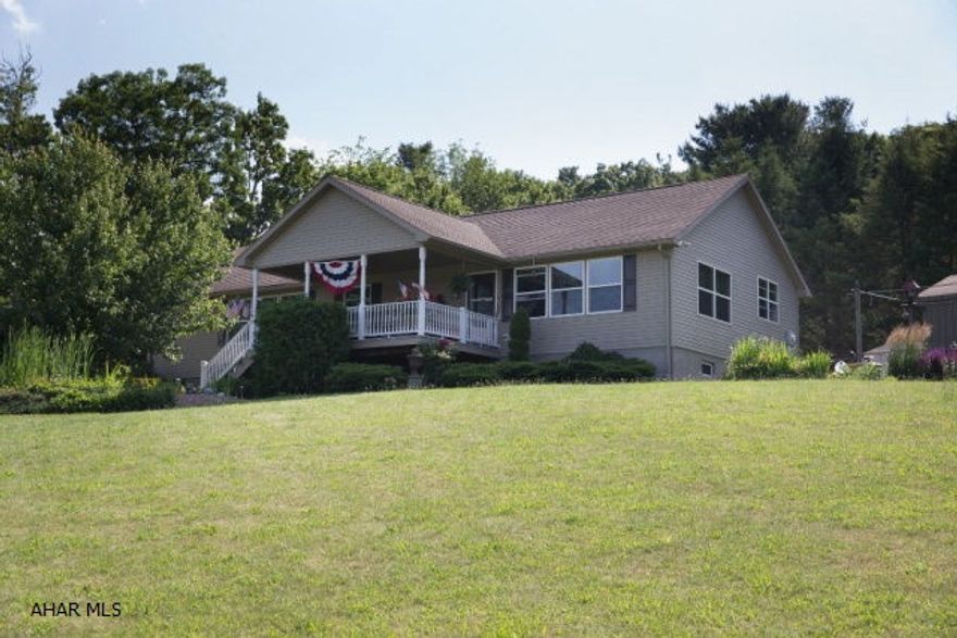 Exquisite living in a close to town but still very private location.  This three bedroom, two bath, ranch home with a two car garage is ready for you to move in to.  Just bring your personal items!  An open floor plan in the kitchen, living, and dining area give this home a modern feel.  Beautiful window light in every room coupled with fantastic views.  The master bedroom is incredibly large and is complimented by a two large walk in closets as well as an on suite.  A covered front porch that is perfect for enjoying the view.  State game lands are just moments away.   A modern home built in 2002 that has been meticulously kept by the sellers, and it sits on a lot that is over an acre.  You will not be disappointed.  Call the listing agent for your private showing today!