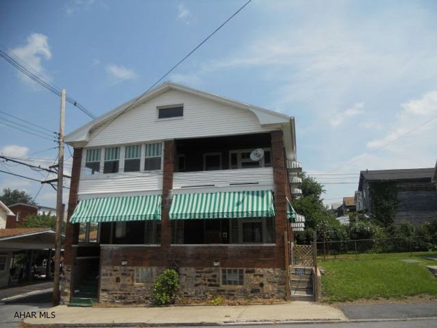 This well maintained brick duplex is a great investment opportunity for a primary residence plus a tenant or for a two unit rental property.  The second floor unit was recently painted, upgraded and the floors refinished. The main level offers a wonderful front porch and great living spaces. Each unit  has 3 nice bedrooms, a full bath, a kitchen with a full complement of appliances and both a living and dining room. There is a washer and dryer hookup in the full basement. The basement offers an abundance of storage space as well. Another benefit of this great offering is that 2 parcels are being sold with this property, including one with a carport for easy off street parking..  This is a property you will not want to miss!