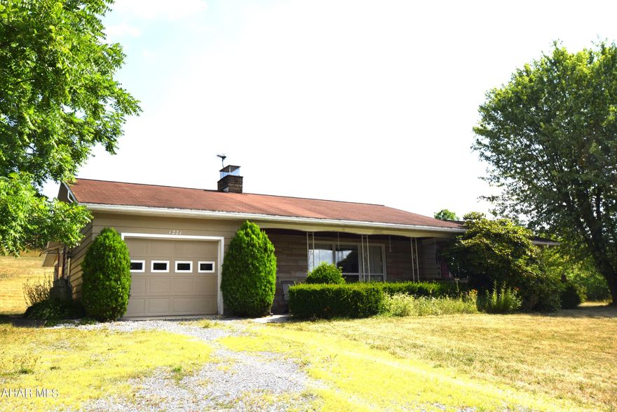 Lovely, well maintained ranch home in rural setting.   Stone fireplace in large living room.  Modern and well appointed  kitchen with good appliances and built in counter seating.  Kitchen  opens to dining room.   First floor laundry room.   Attached garage with storage.   Heat pump for heating and cooling.  Covered front porch, and back porch for outdoor relaxation.