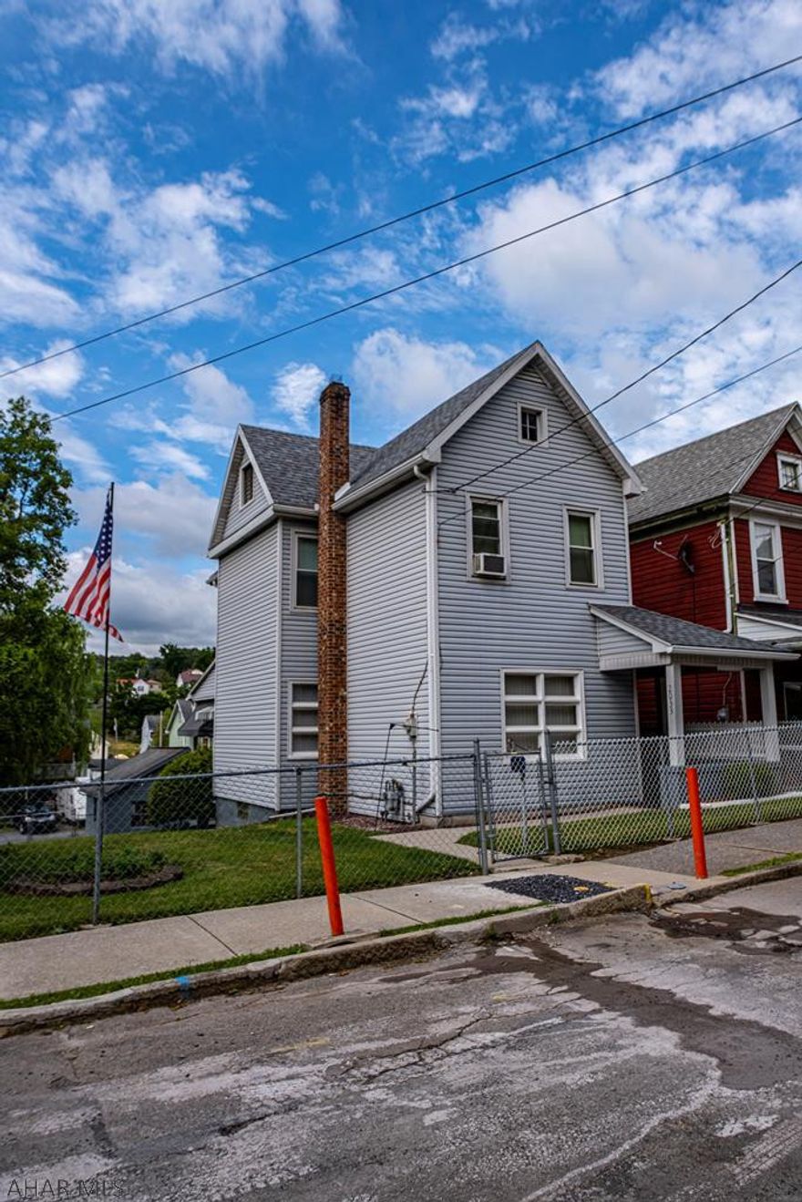 Immaculate ,fenced in,  2 story home with a detached 2 car garage on a double lot. This nice home features on the main level , laundry, a large eat in kitchen , a living room and  a bonus room also covered porches both front and back. The second floor features 3  nicely sized bedrooms and a full bath  with plenty of closet space. Enjoy the double lot for out side activities and the  2 car garage and off street parking.   Many upgrades like a new roof , new Furnace, new windows, new water heater. This is a must see. Motivated Seller.