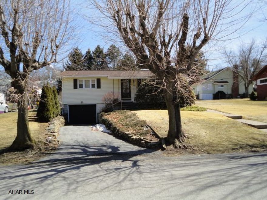 Great neighborhood, three season porch, off street parking, finished room in basement.