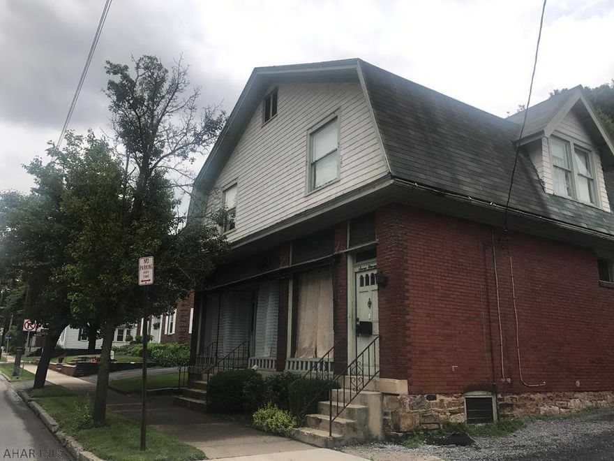 Calling anyone with a vision! This 2 unit building has endless possibility. The first floor is a blank canvas waiting for your masterpiece. The second floor is a 2 bedroom, 1 full bath with lots of space. Seller will make no repairs. Call listing agent for your private showing.