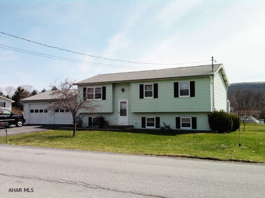 Very nice 3 bedroom bi-level on large corner lot. Partially finished basement. 2 car attached garage.