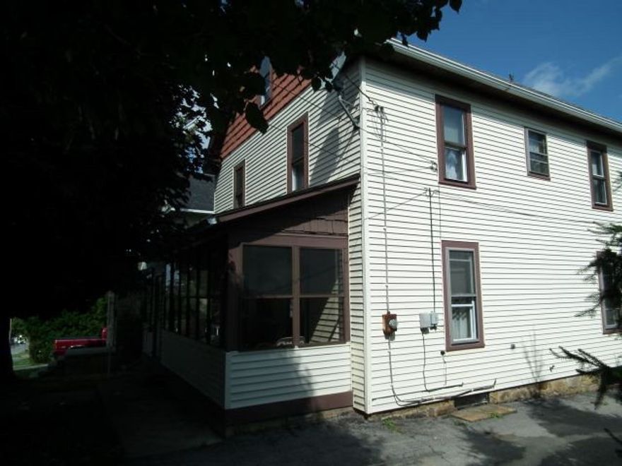 This home offers many possibilities! Situated on a 50 x 150 lot with driveway full length of lot, 2 garages, 4 bedrooms all with wall closets, 1 1/2 baths, 2 enclosed porches, bonus rooms in attic (heated). Needs some updating, but worth the effort, See Pictures! Water $74.50, Electric $65.00 2013-3012, Gas $116.00 (Summer $23.00, Winter $119.00)