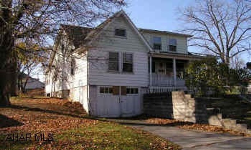 1.5 Story Frame/Aluminum, 3BR/2BA with 1 car detached garage, and 26x16 Former beauty shop on large corner double lot. Newer roof, kitchen cabinets and furnace. Main level laundry, hardwood floors.