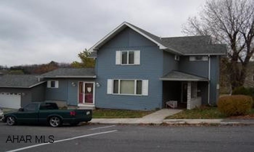 Exceptional!! LARGE rooms throughout. Oak kitchen cabintry/ dining area,livingroom, front entrance w/ closet, huge master BR., w/ master bath, 3 other BR., one with bath and full bath, laundry room on second floor, nice big storage attic, rustic family room in the basement, two car attached garage with storage, Quality construction throughout with oak trim. A must see to appreciate.