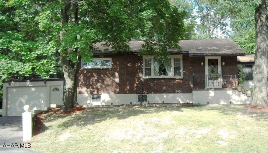 REDUCED!  Perfectly Neat Brick Ranch Home in Frankstown! Logan Township! 2 Bedroom (could have another one in basement), 1 Bathroom, hardwood flooring, large family room, large one car garage, circle drive, outside patio, good mechanicals, on over half of an acre of ground.  Very close to I99 and shopping, ball field, etc.  Take a look!  Wood stove, propane space heater, oil forced air with central air, and is inexpensive to heat.  Fenced area for a pet, shed, and parking areas. 200 Amp Electric & some appliances. A HOME WARRANTY IS INCLUDED!  *Short notice required for appointments please!