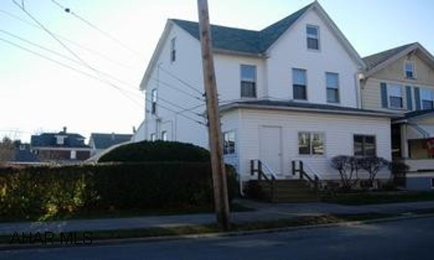 2 - 1BR apartments in duplex with seperate utilities, double lot, full attic & basement, 1 car garage & new roof.