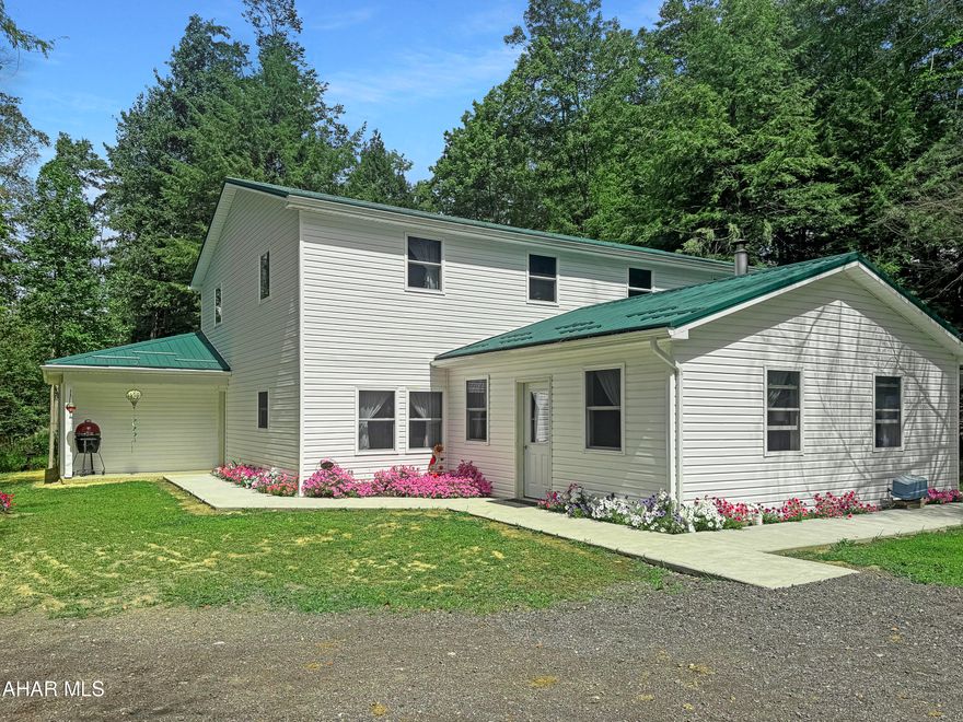 Welcome to 190 Snake Road in Ebensburg, PA! This 4.9-acre property offers a well-designed home built in 2022, a stable, & a detached two-car garage w/ a kitchen built in 2021, providing plenty of space for living, storage, & hobbies. The main floor of the home includes a large kitchen & dining area, spacious living room, first-floor bedroom w/ double closets, office, pantry, bonus room, & a mudroom w/ a full bath, while the second floor adds five bedrooms w/ closets & three additional bonus rooms for flexible use. Outside, you'll find beautiful landscaping, open space, & a creek running through the property, making it both functional & scenic. The home is move-in ready with quality features throughout, & while electric is not yet connected, the seller is willing to assist w/ the process. This property has so much to offer, schedule a showing today!