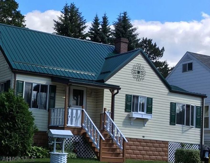 This home is situated on a beautiful lot.  New roof just installed.  This is an adorable cottage story home with many great features, hardwood flooring, character.