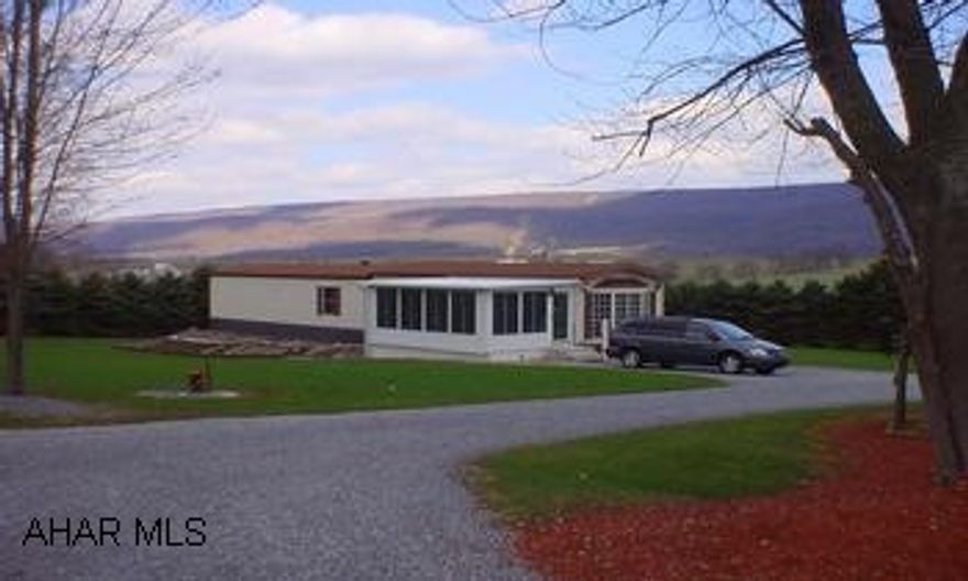 Very nice singlewide with solar shield. Sunroom, central air, workshop with 220 service, garage. Call Sylvia for a showing 330-3408. Very nice singlewide with solar shield. Sunroom, central air, workshop with 220 service, garage. Call Sylvia for a showing 330-3408.