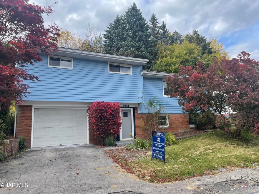 Multi level in Pleasant Valley Area. 3 BR 1.5 bath home featuring  spacious living areas. One car attached garage. New electrical service 2022. Storage area off of back patio. Take a look and make this your home!
