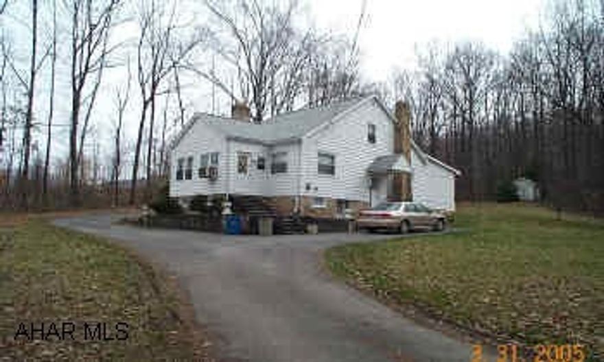 2 BR home near Logan Town Center. Could be great rental-Zoned Commercial.