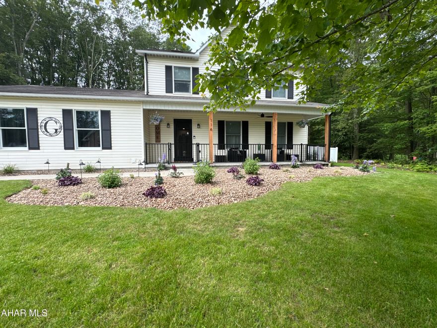 Welcome home to comfort, style and space.  Step inside this beautiful 4-bedroom, 2.5 bath home featuring a warm and inviting open floor plan designed for everyday living and effortless entertaining.  The spacious living room is perfect for gathering with family and friends, while the first floor bedroom and full bath adds flexibility for guests or multi-generational living. The heart of the home is the stunning kitchen, complete with granite countertops, abundant counter space, and a  large pantry. The kitchen flows out to a 10x28 Trex deck where you can relax, unwind or host unforgettable get togethers and also a large front porch for out door enjoyment.   Upstairs you'll find a large bathroom featuring a soaking tub, and a beautiful vanity.  Additional features you'll love are central air for year round comfort, new doors throughout, 2 car attached garage,  and a fenced in back yard offering privacy and piece of mind.  This home has a perfect blend of charm, modern  updates and livable space.  Come experience for yourself.