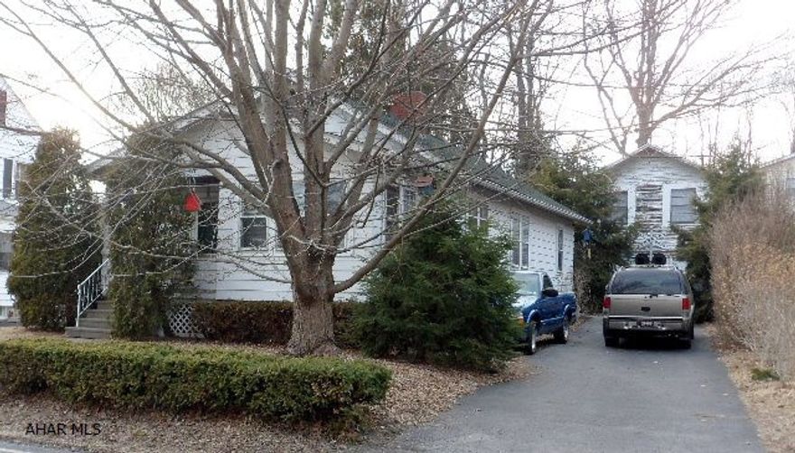 Cozy One Story - 5704 California Ave. - 2 BR, 1 BA, living room with fireplace and sunroom offset, formal dining room with corner cupboard, step saving kitchen with appliances, full basement includes washer, dryer, and pellet stove, 1-car garage has 2nd floor storage, private driveway, lot 51 x 120, partially fenced yard with pussy willows, cherry and apple trees. Updates include: New furnace, roof 2004, some new tilt windows, blown fiberglass insulation in walls 1998, driveway paved 2009. Sold AS IS $69,900.