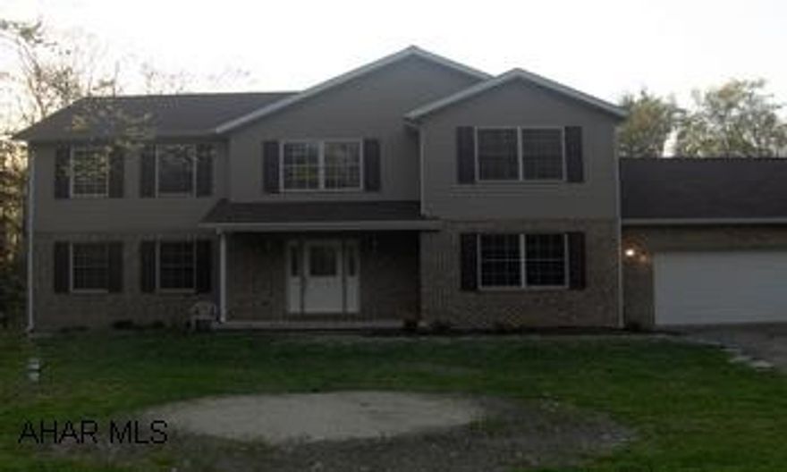 Two story home built 2006 situated on 3.7 acres, large spacious rooms, beautiful fireplace, large deck. Master bedroom suite with exceptional bath Fabulous two story home in Country setting. Many fine amenities. Lane to property has shared maintaince with neighbor