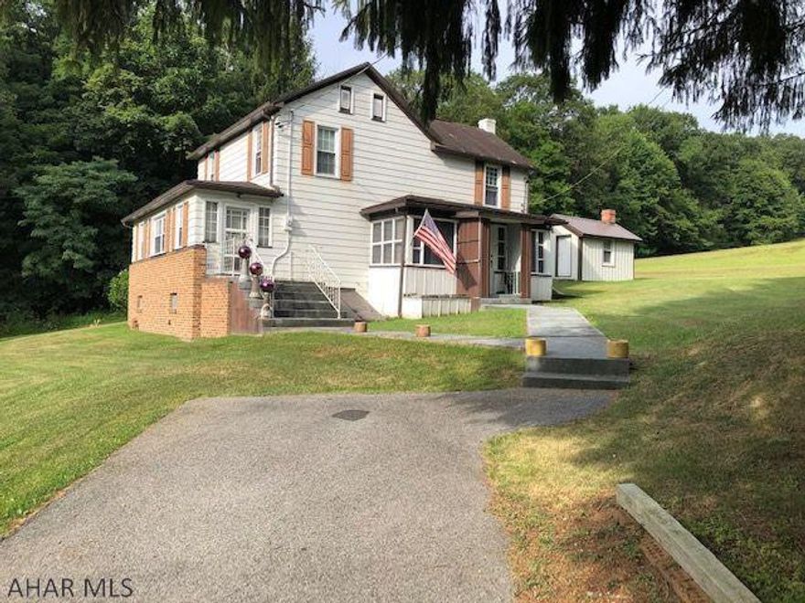 Peaceful, country living! Close to 5 acres with 3 bedroom, 1 bath farmhouse located just miles from access to Raystown Dam and resort. Newer 30'x40' pole building with 2 garage doors, 24'x24' frame 2 car garage, 19'x24' workshop, and smokehouse. Buildings large enough for RV and recreational vehicle storage. Black top drive with vinyl fencing. Seller is offering a 1% discount to Veterans with documentation.