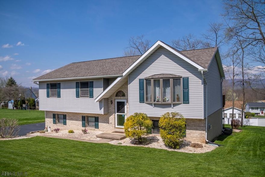 Beautiful house & great location - this is a perfect place to call your home! 3 bedrooms, 2.5 baths. So many unique features including an eat-in kitchen with skylight, Wet Bar in basement, finished basement with fireplace, and beautiful deck off the dining room - perfect for entertaining. 2 car garage, central air, new roof. Looking for privacy? This property is located in a quiet area in Logan Township with vacant lots on both sides of the house.