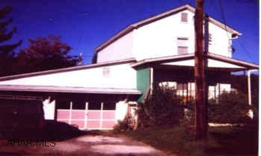 2 bedroom home with large fenced in lot, 2-car garage with workshop. 2 bedroom home with large fenced in lot, 2-car garage with workshop.