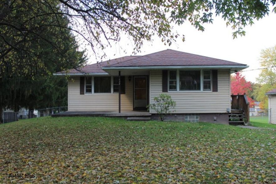 3 bedroom home on a nice .7 acre lot. This home has hardwood floors and recently updated main bathroom. The basement can be finished for additional living space. Basement has a walk out onto a covered patio and onto a beautiful flat fenced in back yard. Conveniently located between Altoona & State College