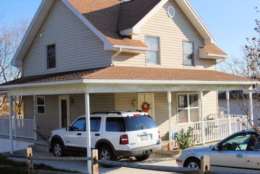 This nicely updated home with warm, modern colors feels like home the minute you walk in the door.  New carpeting and laminate flooring.  Huge master bedroom.  Central air.  Carport.  Wrap-around porch.  Ebner elementary school.