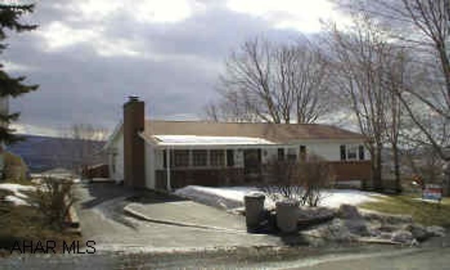 Move-in condition- Gas fireplace in basement,Wood fireplace in Living Room, Bar Basement, Nice Lot.