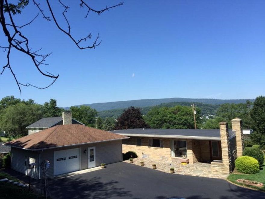 Well kept 3 bedroom, 1 1/2 bath home in beautiful Meadowbrook. Stone exterior with gorgeous architectural detail on 2 lots giving a spacious 0.769 acre. 2 car integral garage with additional detached 24x32 (1) car garage with large workshop. New garage doors, newer roof, newer furnace. Finished basement with kitchen. Stone fireplace in large living room that leads to a stone patio with built-in bbq and a backyard oasis that is private and serene. (2) 200 amp electric services and Security System. Exceptional home at a great price!