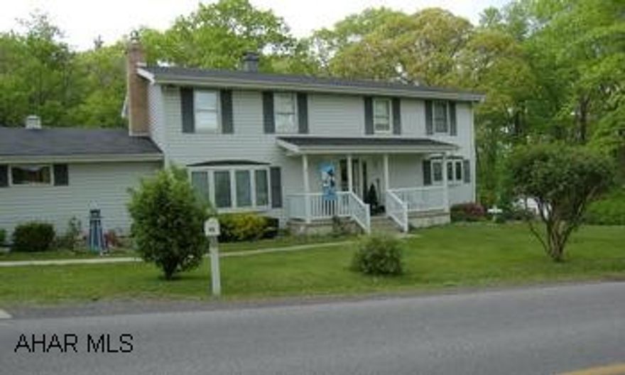 3 BR home on 2+ acres. Quiet Country Setting. Wooded Lot. Central Air. Bellwood Antis School District.  Home Warranty. Motivated Seller! Immaculate 3BR home on 2.37 acres, private location beautiful stepdown living room w/gas fireplace, sun porch, 3 tier deck in back, central air. Home is in excellent condition, newer carpet throughout,  recently painted, 2 car garage, access to outside 200 amp socket. Ready to move in. Quiet country setting, nice area. Home warranty included.