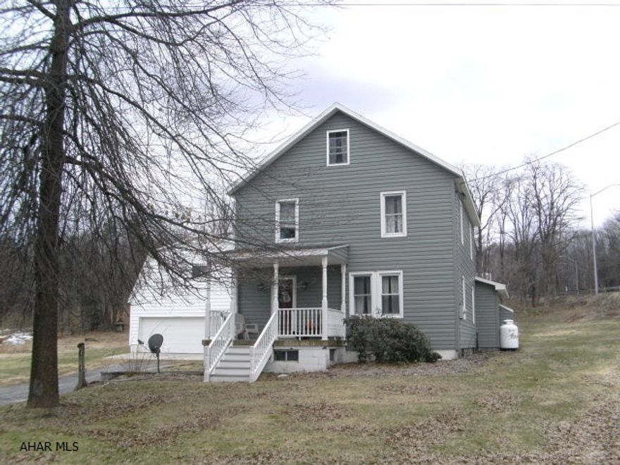 A Must See! Totally remodeled two story home, large lot, detached 3 car garage with 2nd floor storage. Above ground pool, heater and all equipment included. 3 bedrooms, 2 large baths, 1st floor laundry, new stainless appliances, family room with fireplace, large eat in kitchen, formal dining room. This home has so much to offer! 2 additional lots also included.