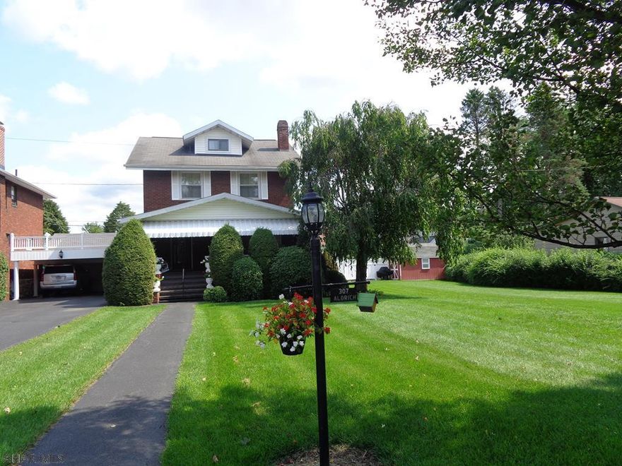 MOTIVATED SELLER!  This Aldrich Ave home is a symbol of luxury.  Outstanding outside & inside.  Stunning 1st floor Family Room & Full Bathroom.  A welcoming front porch invites relaxation & delivers jaw-dropping curb appeal.  Quartz kitchen countertop, 2 car garage, plus 2 car carport.  Hardwood floors under carpet.  Finished attic is the 3rd bedroom.  One of the bedrooms is currently used as a walk in closet.