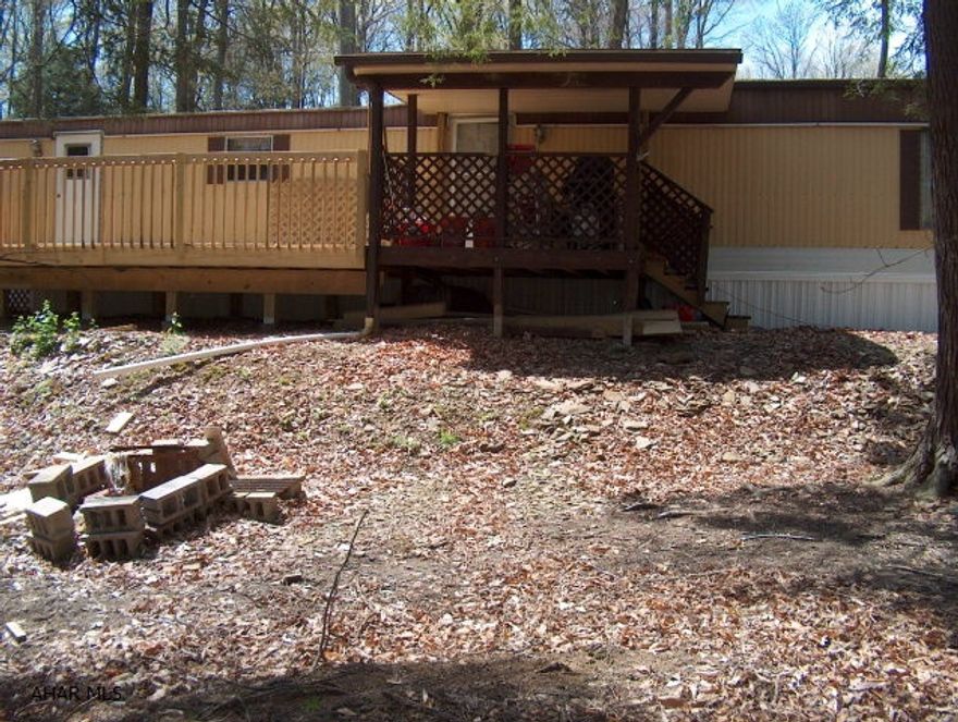 Great starter home or get-away. New plumbing, new decks, new carpet