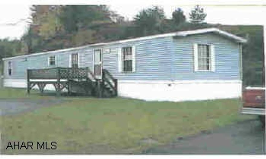 Pick your own color of carpeting for livingroom and bedroom. Hardwood floors in kitchen. New wallpaper. New furnace. Asphalt shingle roof. Rented lot. $214/month includes water/sewer/trash. Very nice. Pick your own color of carpeting for livingroom and bedroom. Hardwood floors in kitchen. New wallpaper. New furnace. Asphalt shingle roof. Rented lot. $214/month includes water/sewer/trash. Very nice.