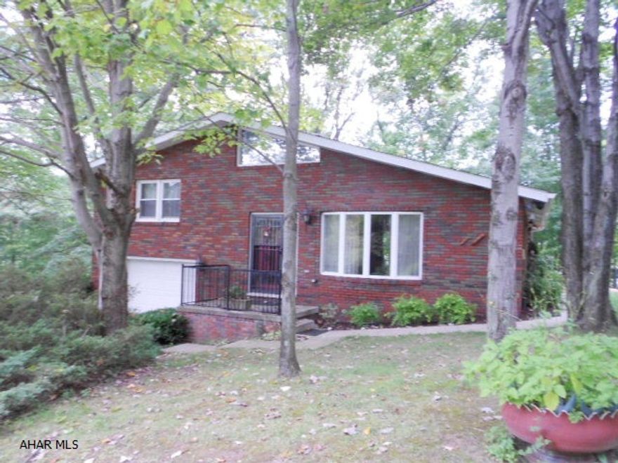 1 story brick home on a great lot. Newer roof, windows, furnace, electrical. Property has 2 bedrooms & 2 baths with finished basement, attached & detached garage. Great lot in a great location. Seller had the property connected to public sewer. Interior needs very little TLC. This is a well built home looking for you to make the move with your offer. Motivated Seller. Sell is offering interior painting credit. Make your offer today.