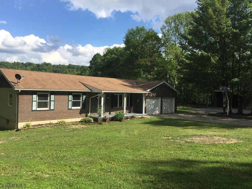 Very private setting and well constructed ranch home on a 2 acre lot. The home features 3 bedrooms with hardwood floors and 3 bathrooms. The main floor has a large living room, eat in kitchen, and an awesome covered back deck.  I addition a two car garage as well as a two story pole barn. This home offers beautiful views of the surrounding countryside and is only a half hour to Altoona.Call today to see.  This home is agent owned.
