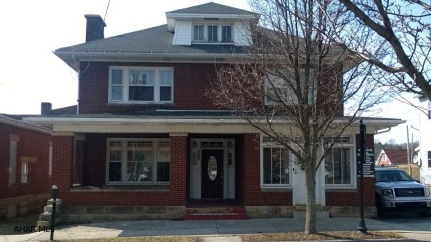 Experience the charm and character of this stately home in the heart of Ebensburg. First floor features a large living room with stone fireplace, built-in bookcases and unique wooden paneled doors and window shutters. Enjoy a roomy dining room with two windows providing natural light. A large room on the first floor has multiple uses either as a family room or bedroom. A 3/4 bath is located on 1st floor. The second floor features 5 bedrooms and two full bathrooms. This home also features a side office area which is currently rented and would add additional monthly income. Central Business District zoning provides multiple uses with certified residential use. Garage with additional parking in the rear.  Must see to imagine the possibilities that can be created with some TLC!