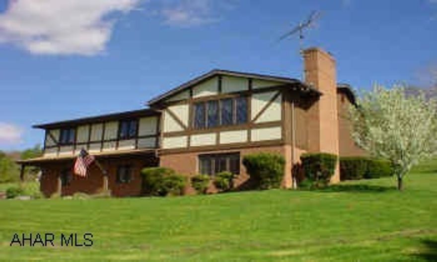 HANDSOME BRICK & TUDOR ON 1.75 ACRE - SCOTCH VALLEY HOME FEATURES LIVING ROOM W/ BRICK FIREPLACE, FORMAL DINING ROOM, LARGE 29'X16' FAMILY ROOM WITH WOOD/ COAL BURNER. WOOD DECK, NEWER ROOF. ELECTRIC AVERAGES $155 PER MONTH + $300 PER YEAR FOR COAL. HANDSOME BRICK & TUDOR ON 1.75 ACRE - SCOTCH VALLEY HOME FEATURES LIVING ROOM W/ BRICK FIREPLACE, FORMAL DINING ROOM, LARGE 29'X16' FAMILY ROOM WITH WOOD/COAL BURNER. WOOD DECK, NEWER ROOF. ELECTRIC AVERAGES $155 PER MONTH + $300 PER YEAR FOR COAL.