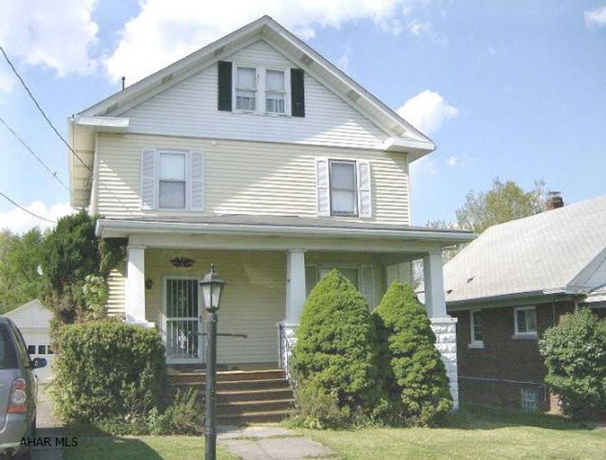 Ebensburg- 2 story 3 BR vinyl sided home with large LR. Hardwood floors. 1 car detached garage on level lot.