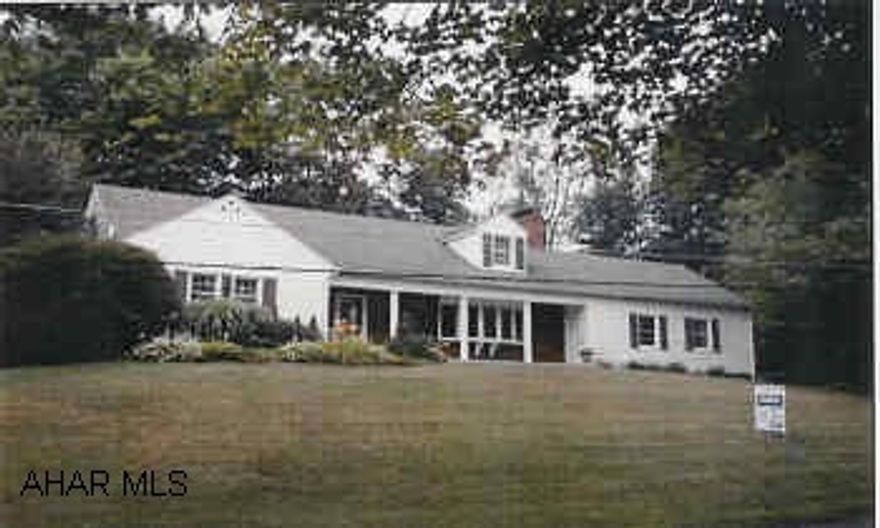 METICULOUSLY MAINTAINED HOME WITH BEAUTIFUL HARDWOOD AND CERAMIC FLOORS.  GARDEN ROOM  FIRST FLOOR BEDROOM.  EXQUISITE LIGHTED LANDSCAPING.  CONVENIENT LOCATION.  HOME WARRANTY INCLUDED