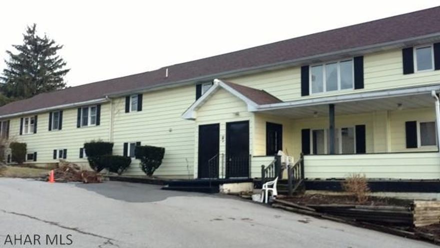 Great investment opportunity!  Huge bldg, previously a Personal Care Home, has so many income producing possibilities.  Plenty of off street parking - great location for medical, retail, office space, etc.  The original part of the bldg is a 4BR, 2BA apt w/ kitchen, LR, DR and an office.  In 1977 an addition was built consisting of 13 BR on 2 floors, a kitchen, 2 spacious lounge areas, DR, 2 Full and 5 half baths.  Each set of 2 BRs shares a half bath.  There is emergency lighting, and fire alarm systems plus central vac and an intercom system.  Property has 2 separate 200 amp elec. systems, 2 updated furnaces and 4 oil tanks.  New 35 yr dimensional roof installed in approx 2014.  Must see - Call Listing Agent for appointment.