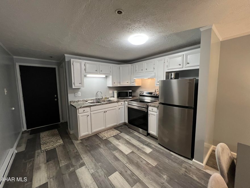 2 bed 2 bath unit in the Allegheny Mountains at Blue Knob All Seasons Resort has everything you need.  Remodeled and fully furnished. New kitchen countertops, flooring and appliances. Walking distance to indoor pool/hot tub, outdoor pool and The Club House Bar & Grille. Blue Knob is the 2nd highest mountain and highest skiable mountain in Pennsylvania! In addition to an array of winter activities, Blue Knob also has a full-service all seasons Conference Center for weddings and events, they also offer golf, swimming and multitude of trails for hiking, running, and mountain biking. Visit https://blueknob.com/activities-events/ to see all the fun events that are happening at Blue Knob. $292.00/ Mo HOA fee includes: pools, hot tub and gym area, tennis and pickle ball courts, building, property maintenance & garbage.  *Conference center, Golf and Ski resort is not included in HOA fee. *