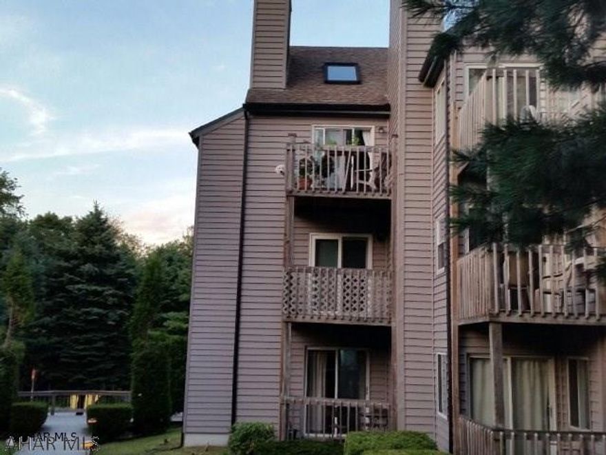 Studio with loft.  Add a bed to the loft to sleep 6.  Already included is alcove bed and double lounge love seat and nice furnishings.  Balcony overlooks the Indoor Pool building and has a nice wooded view. Electric system is breakers.  $255/mo dues include use of indoor & outdoor pools, hottub, tennis court, outside maintenance & trash removal. Sq ft per tax card - buyer to verify sq ft & taxes.  J-425