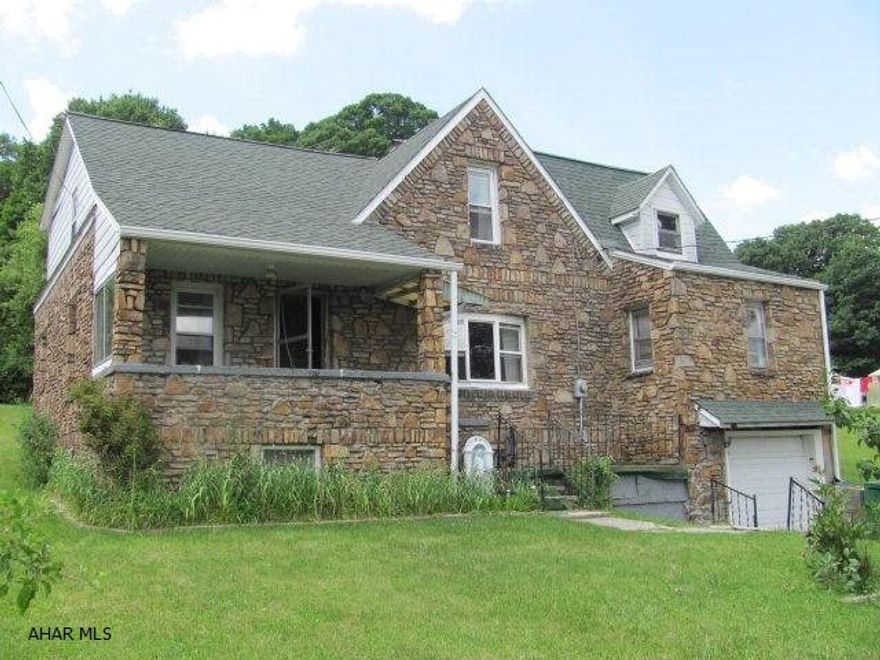 Central Cambria schools! 3 BR stone home on approx 1.8 acre lot. 1 car integral garage. Oil HW heat. Full unfinished basement.