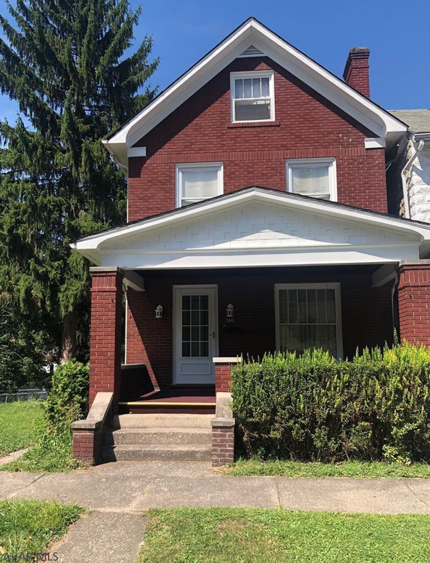 Well cared for Brick home on Double lot. Hardwood floors under carpet. Beautiful woodwork., Pocket doors.  Large Rooms and many closets. Newer Roof and Furnace. Two bedrooms on 2nd floor and two bedrooms on third floor.  With some updates this could be the home you've been looking for!