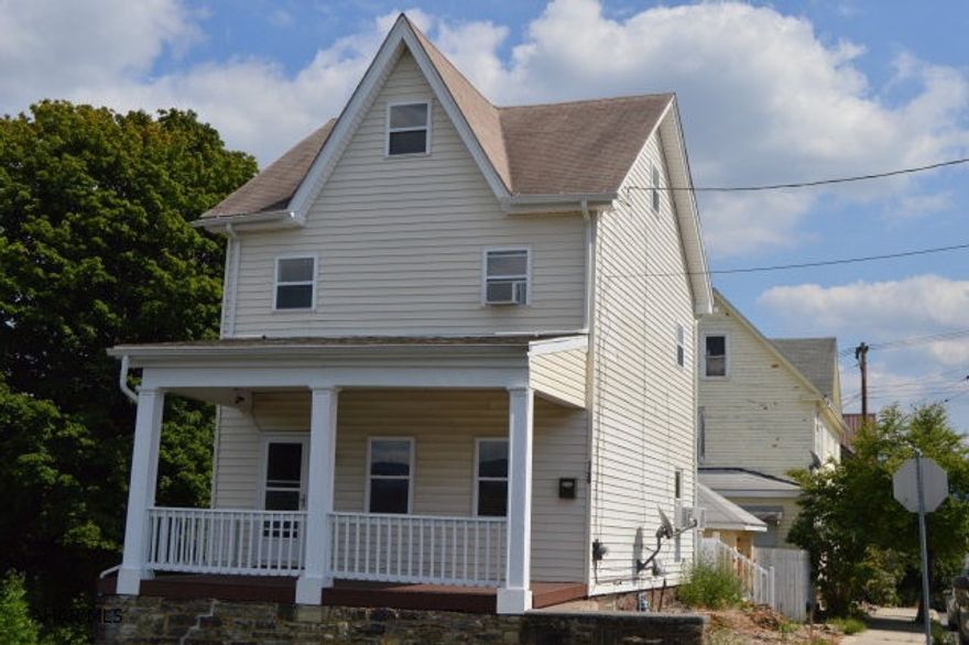 Completely renovated home-move in ready! 4 bedroom, 2 bath home for an amazing price. Newer windows,carpeting,gutters and so much more. Sits on a corner location with a vacant lot beside it. Provides a private & quiet area to live with great views of the city.