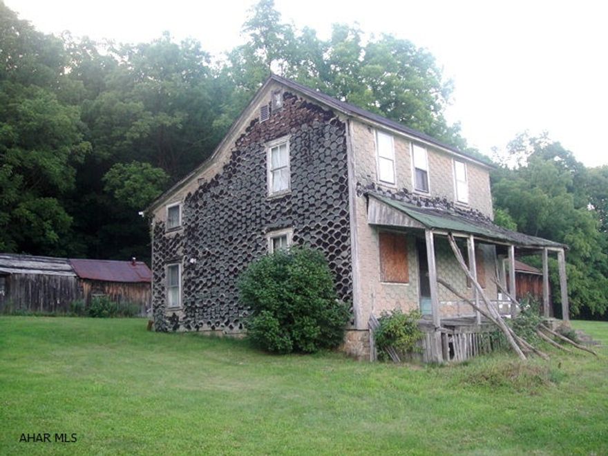 7.983 acres on Plank Road, Everett. Two-story colonial home w/ 4 BR's. House not currently livable. Well and septic on property. 9x26 frame shet and 19x36 flat barn. Nice property in a serene location!