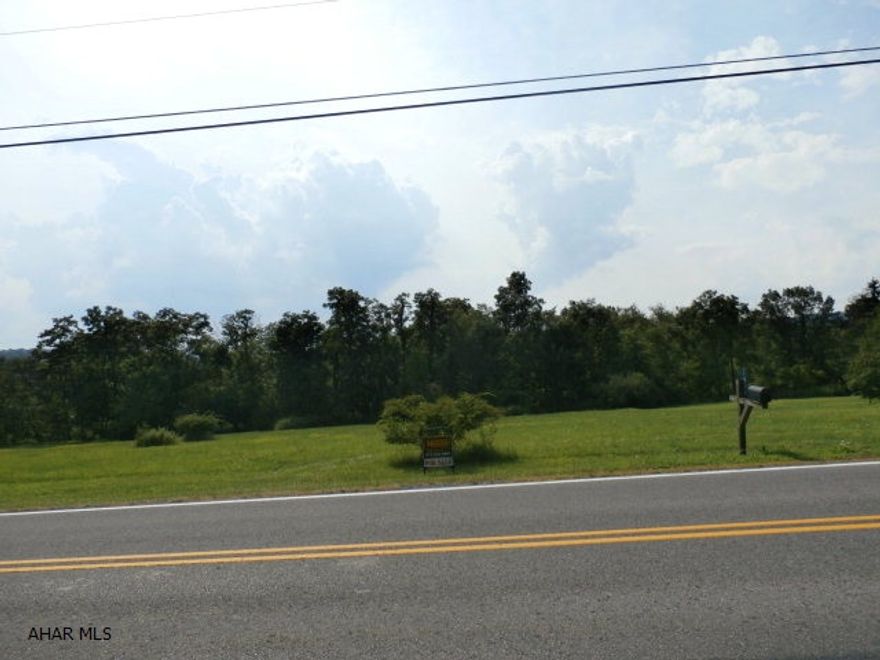 1.04 acre Flat building lot in Hollidaysburg.  Needs perk test. Also nice area for storage unit buildings. Could be an income producing  property.